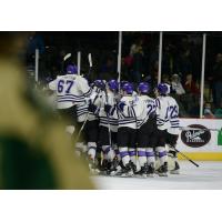Tri-City Storm celebrate their 16-round shootout victory over the Sioux City Musketeers