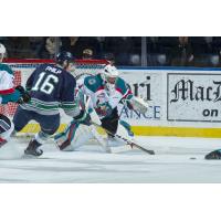 Kelowna Rockets goaltender James Porter keeps his eye on the puck