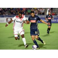 Defensive midfielder Brandon Eaton with the Richmond Kickers (left)