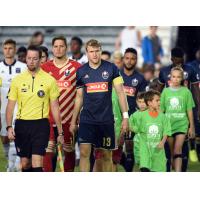 Defender Connor Tobin enters the pitch with North Carolina FC