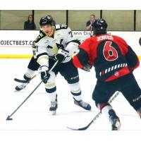 Wheeling Nailers forward Mark Pettacio with the puck against the Cincinnati Cyclones