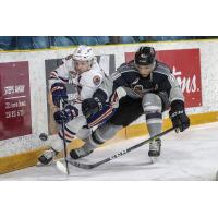 Vancouver Giants defenceman Alex Kannok Leipert (right) battles against the Kamloops Blazers