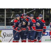 Saginaw Spirit gather after a goal
