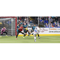 St. Louis Ambush defend against a hard Kansas City Comets' shot