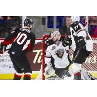 Vancouver Giants goaltender David Tendeck stops a Prince George Cougars' shot