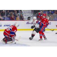 Bowen Byram of the Vancovuer Giants takes a shot against the Spokane Chiefs