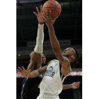 Halifax Hurricanes guard Joel Kindred battles the Saint John Riptide
