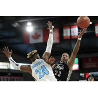 Halifax Hurricanes forward Meshack Lufile defends against the Moncton Magic