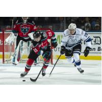 Kelowna Rockets centre Kyle Crosbie races up the ice with the puck against the Victoria Royals