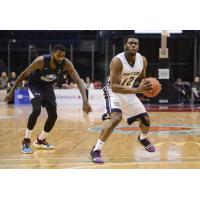 Halifax Hurricanes shooting guard Terry Thomas (left) against the Saint John Riptide