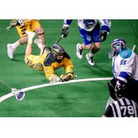 Lyle Thompson of the Georgia Swarm dives for a shot attempt against the Rochester Knighthawks