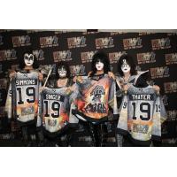 Legendary band KISS holds their Quad City Storm jerseys