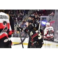 Cleveland Monsters defenseman Tommy Cross and center Mark Letestu (55) celebrate a goal