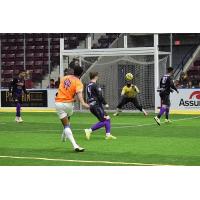Mississauga MetroStars' Raheem Rose strikes a shot from distance at Harrisburg Heat goalkeeper William Banahene