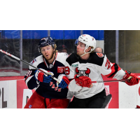 Binghamton Devils left wing Brandon Gignac (right) against the Hartford Wolf Pack