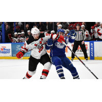 Binghamton Devils defenseman John Ramage delivers a blow to the Syracuse Crunch