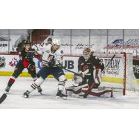 Prince George Cougars defenceman Daylan Kuefler and goaltender Taylor Gauthier vs. the Kamloops Blazers