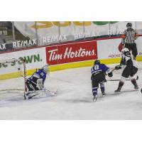 Vancouver Giants defenceman Alex Kannok Leipert (right) scores against the Victoria Royals