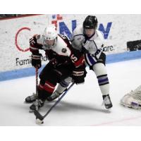 Odessa Jackalopes forward Liam O'Hare (left) vs. the Lone Star Brahmas