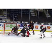 Prince George Cougars goaltender Taylor Gauthier stops a Kelowna Rockets shot