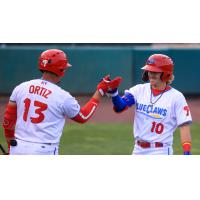 Bryson Stott of the Jersey Shore BlueClaws receives congratulations from Jhailyn Ortiz