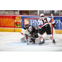 Hershey Bears goaltender Pheonix Copley makes a stop on Ryan Fitzgerald of the Lehigh Valley Phantoms