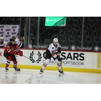 Lehigh Valley Phantoms defenseman Logan Day with the puck against the Binghamton Devils