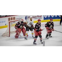 Grand Rapids Griffins goaltender Calvin Pickard and his defense against the Chicago Wolves
