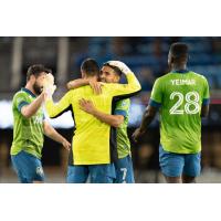 Seattle Sounders FC exchange congratulations against the San Jose Earthquakes