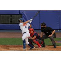 David Thompson of the Syracuse Mets follows through on his home-run swing in the third inning on Thursday night