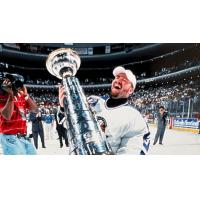 Orlando Solar Bears goaltender Norm Maracle lifts the Turner Cup