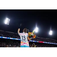 San Diego Wave FC's Alex Morgan waves to the crowd after her final professional match