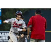 Michael Hallquist of the Fargo-Moorhead RedHawks rounds the bases following his home run