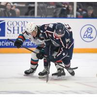 Kelowna Rockets' Tij Iginla battles Tri-City Americans' Jake Gudelj