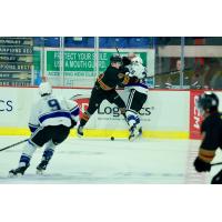 Vancouver Giants defenceman Mazden Leslie pancakes a member of the Victoria Royals