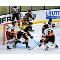 Wheeling Nailers' David Jankowski and Logan Pietila battle Fort Wayne Komets' Kyle Mayhew and Jack Gorniak