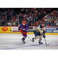 Grand Rapids Griffins' Cross Hanas and Milwaukee Admirals' Jesse Ylönen on the ice
