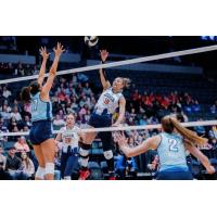 Grand Rapids Rise middle blocker Ali Bastianelli (right)