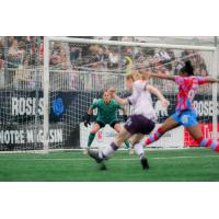 Montreal Roses goalkeeper Gabrielle Lambert defends against Halifax Tides FC
