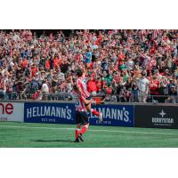 David Rodríguez and Manu Aparicio of Atlético Ottawa celebrate