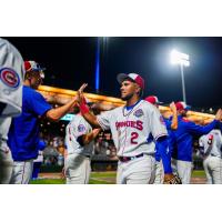 Knoxville Smokies shortstop Pedro Ramirez exchanges high fives