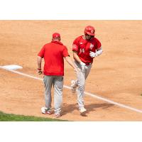 Matthew Warkentin of the Winnipeg Goldeyes rounds the bases