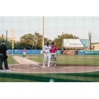 Biloxi Shuckers catcher Darrien Miller crosses home plate