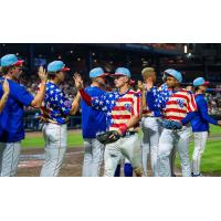 Knoxville Smokies exchange high fives following a win
